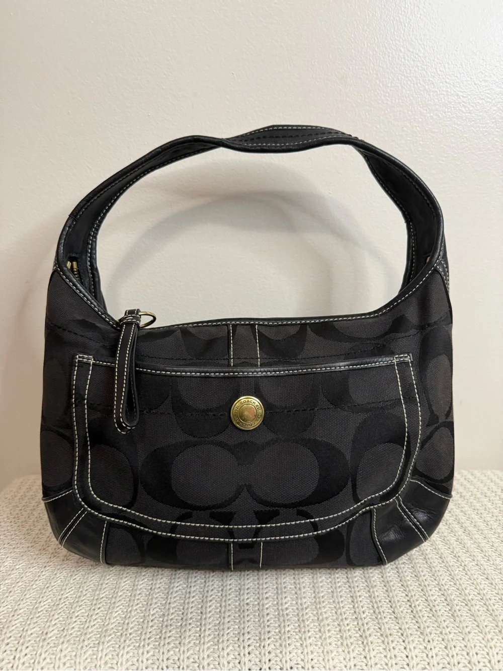 Coach Ergo Signature Jacquard Hobo bag featuring a black-on-black